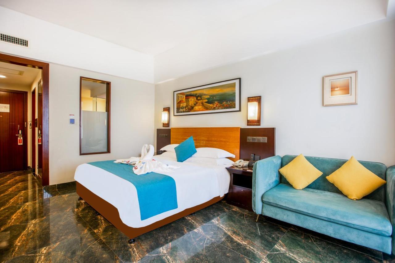 Shengyi Holiday Villa Hotel Санья Экстерьер фото